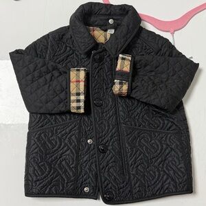 Burberry Black Quilted Jacket with Plaid Accent 
Barely Worn